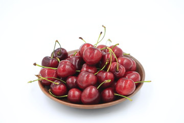 The big cherries are on a white background
