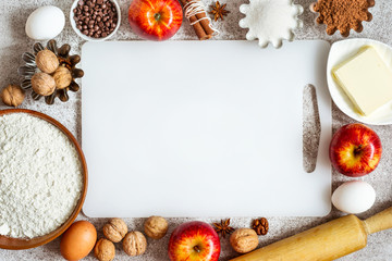 empty cutting board and Ingredients for baking with apples and spices