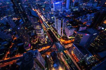 The light on the road at night and the city in Bangkok, Thailand on March 31, 2015.