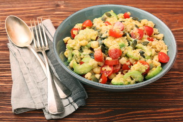 Chickpeas lentils avocado tomato cucumber salad