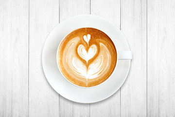 Top view latte art coffee on wood background
