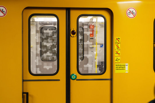 Yellow subway door, Berlin