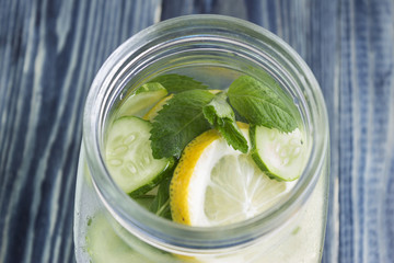 Detox water with lemon and cucumber. Health and body cleansing.