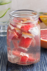 Fototapeta na wymiar Detox water with grapefruit. Health and body cleansing.