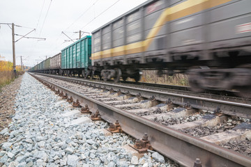Obraz premium Railway road and trees in yellow colors