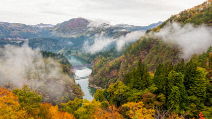 Tadami river and brige in autumn season. ( Picture with Oil painting filter effect)