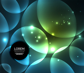 Glowing shiny overlapping circles composition on dark background