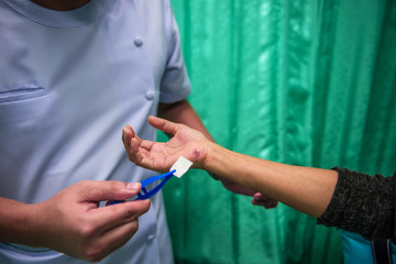 Soft focus and the background blurred nurses are contiguous with lesions of patients with wounds caused by an accident.dressing.