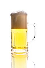 Glass mug with beer isolated on white