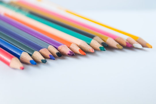 Color pencils isolated on white background close up
