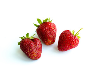 Ripe, red strawberry on white background