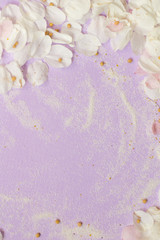 Spring blossoming flower on the light lavender background. Space for text