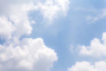 Blue sky and clouds background.