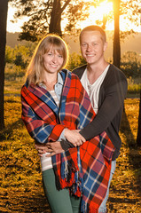 Naklejka premium young loving couple standing hugging