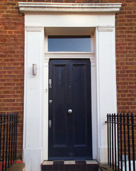 Obraz na płótnie Canvas Notting hill, London, grunge entrance black door