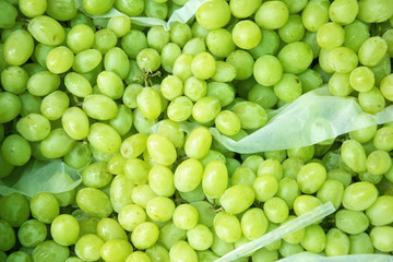 Green grapes for sale at a market