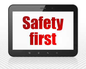 Protection concept: Tablet Pc Computer with Safety First on display