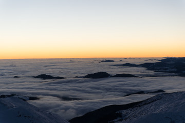 Fototapeta na wymiar scenic sunrise, sunset in the winter mountains. mountain range