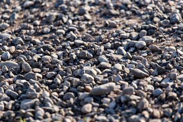 Crushed stone on the road as a background
