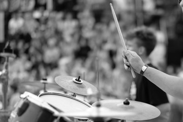 Obraz premium The drummer's hand with a stick behind the drum set. Baltic Drum Summit 2017. Riga, Latvia.