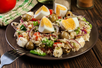 Fresh salad with couscous and eggs