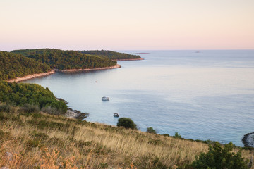 Naklejka premium Boat in Dumbocica cove