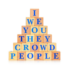 Pyramid of wooden blocks with words
