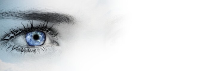 Close up of eye with globe in iris and blurry white transition
