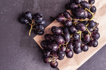 Black seedless grapes, top view flat lay