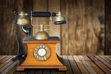 Fototapeta na wymiar Vintage telephone on table