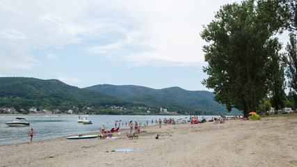 Fototapeta na wymiar people enjoying summer on beach. life on beach in summer