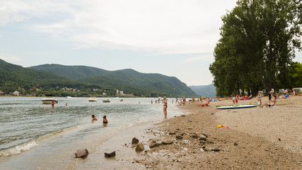 Fototapeta premium people enjoying summer on beach. life on beach in summer