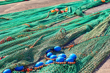 Long bottom trawl оn the shore.