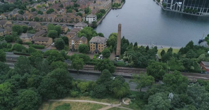 Aerial descending view of the Millwall outer dock in the financial district of the Docklands in London
