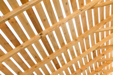 Wooden roof construction. Building in progress. House construction process.