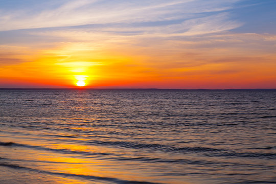 Stunning sunset on the empty beach, Cape Cod, USA