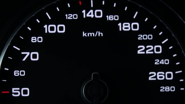 Closeup on a modern black speedometer