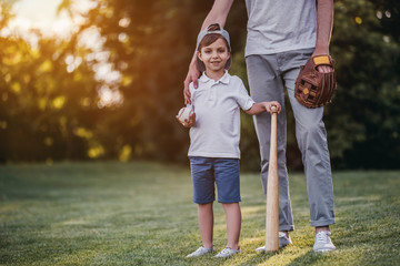 Fototapeta premium Dad with son playing baseball