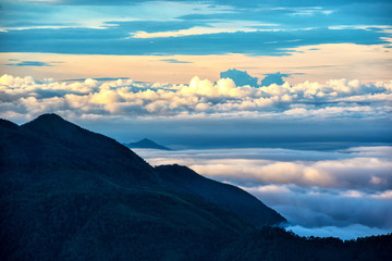 Light morning with fog floating on the mountain and sky is a beautiful view. And is a popular tourist destination of the photographer to capture nature. The Doi Inthanon Chiang Mai, Thailand.