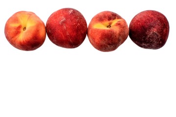 A few ripe peaches isolated on a white background