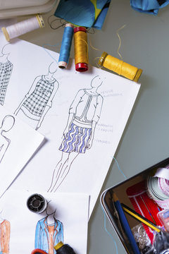Fashion designer's sketches on a working table