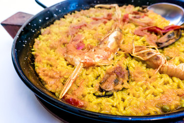 Prawn with rice - closeup of prawn with rice - traditionnal spanish food paella