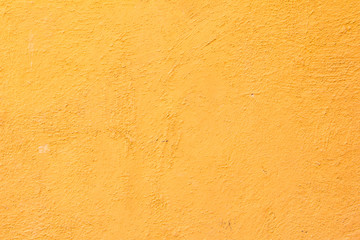 Orange color concrete wall background