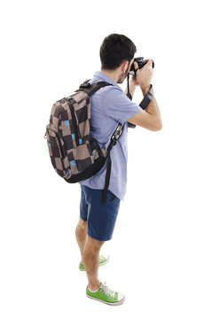 Back view of tourist photographer man taking picture. Isolated on white background