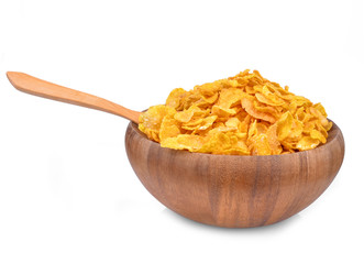 Wooden bowl of cornflakes, isolated on white background