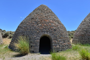 Charcoal ovens used for creating charcoal for the smelting of ore in Nevada in the early 20th century.