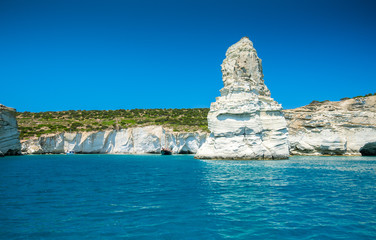 Rock formations and sea caves at Kleftiko shoreline in Milos, Greece