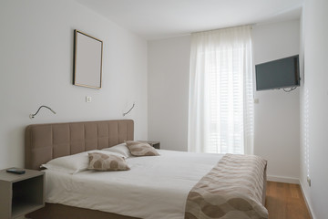 Fototapeta na wymiar Interior of a bedroom in a villa
