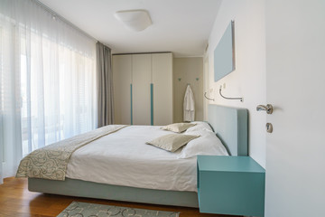 Fototapeta na wymiar Interior of a bedroom in a villa