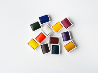 Watercolor godets on white background. Flat lay. Copy space